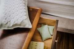 Kanjo Mint Sachet Refills beside pillows for a calm, minty ambience