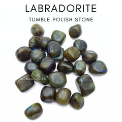 Karma Gems Labradorite stones in hand showing size and calming energy balance