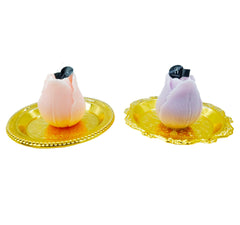KCVC tulip candle purple on tray suits elegant gatherings.