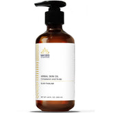 Kerala Ayurveda Eladi Thailam bottle closeup highlights nourishing skin oil.