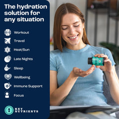 A user taking KEY NUTRIENTS Electrolyte Tablets during a workout for hydration.