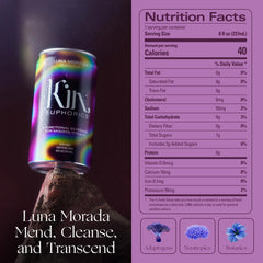 Kin Euphorics Luna Morada being poured into a glass, releasing tangy aroma.