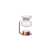 Kinto Aroma Oil Warmer copper cup radiates warmth while releasing fragrance.