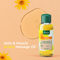 Kneipp Arnica massage oil being poured into hands for soothing muscle relief after activity.