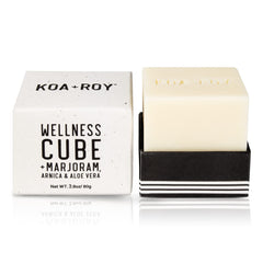 KOA ROY Wellness Cube bar being massaged to release oil.