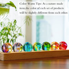 KRISININE LED wooden base supports elegant illumination and display.