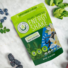Kuli Kuli Moringa Greens scoop near powder for morning shakes.