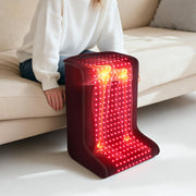 LAFCARE red light therapy pad around the foot for targeted relaxation and comfort.