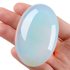 LAIDANLA Opal palm stone in hand highlights portable serenity and focus