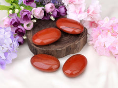 LAIDANLA Red Jasper palm stone on desk decor creates a serene workspace