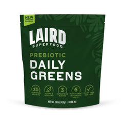 Laird Superfood Prebiotic Daily Greens powder tub highlights vitamin-rich blend for daily nutrition
