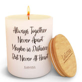 Laleena memorial candle in lavender glass jar emits calm, balanced fragrance.