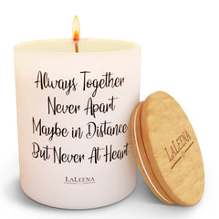 Laleena memorial candle in lavender glass jar emits calm, balanced fragrance.