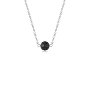 Lenoup lava stone diffuser necklace close-up shows the bead ready to diffuse essential oils.