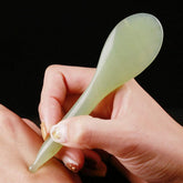 LEOSENSE jade pen closeup for soothing facial tension and precise massage