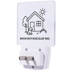 Liovsiso EMF Blocker night-light glows softly in a bedroom for gentle ambience.