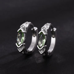 LIU JUN moissanite closeup reveals a sparkling stone on a healing-inspired hoop.
