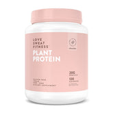 Love Sweat Fitness chocolate protein powder bottle pour shows creamy texture for a post-workout shake