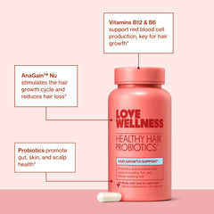 Pouring Love Wellness Healthy Hair Probiotics into a glass for daily routine.