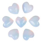 Loveliome Opalite heart palm stone closeup for relaxation and focus.