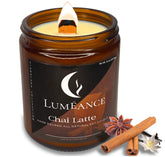 Lumeance Chai Latte Candle in amber jar with crackling wood wick for cozy ambiance.