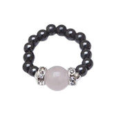 MagneHealth rose quartz ring close-up for balanced energy on the go.