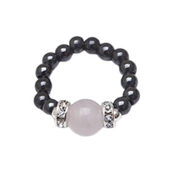 MagneHealth rose quartz ring close-up for balanced energy on the go.