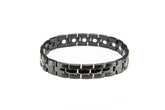 MagneHealth stainless steel bracelet close-up highlighting durable black high-gloss finish