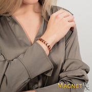 MagnetRX adjustable women's bracelet showing sizing tool used for a precise fit