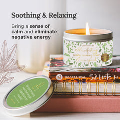 Magnificent 101 Manifest Money Candle tin exterior with warm glow