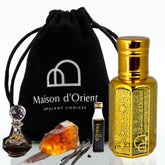 Maison d'Orient Amber Reverence bottle with pour spout, long-lasting woody aroma.