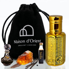 Maison d'Orient Amber Reverence bottle with pour spout, long-lasting woody aroma.