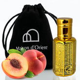 Maison d'Orient Peach Perfume Oil bottle front with vibrant peach notes for lasting scent
