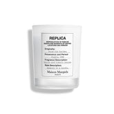 Maison Margiela Replica From The Garden Candle with tomato leaf note brightening the room