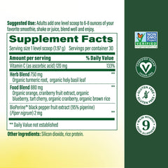 MegaFood Daily Turmeric Powder label close up highlights vegan non-GMO ingredients.