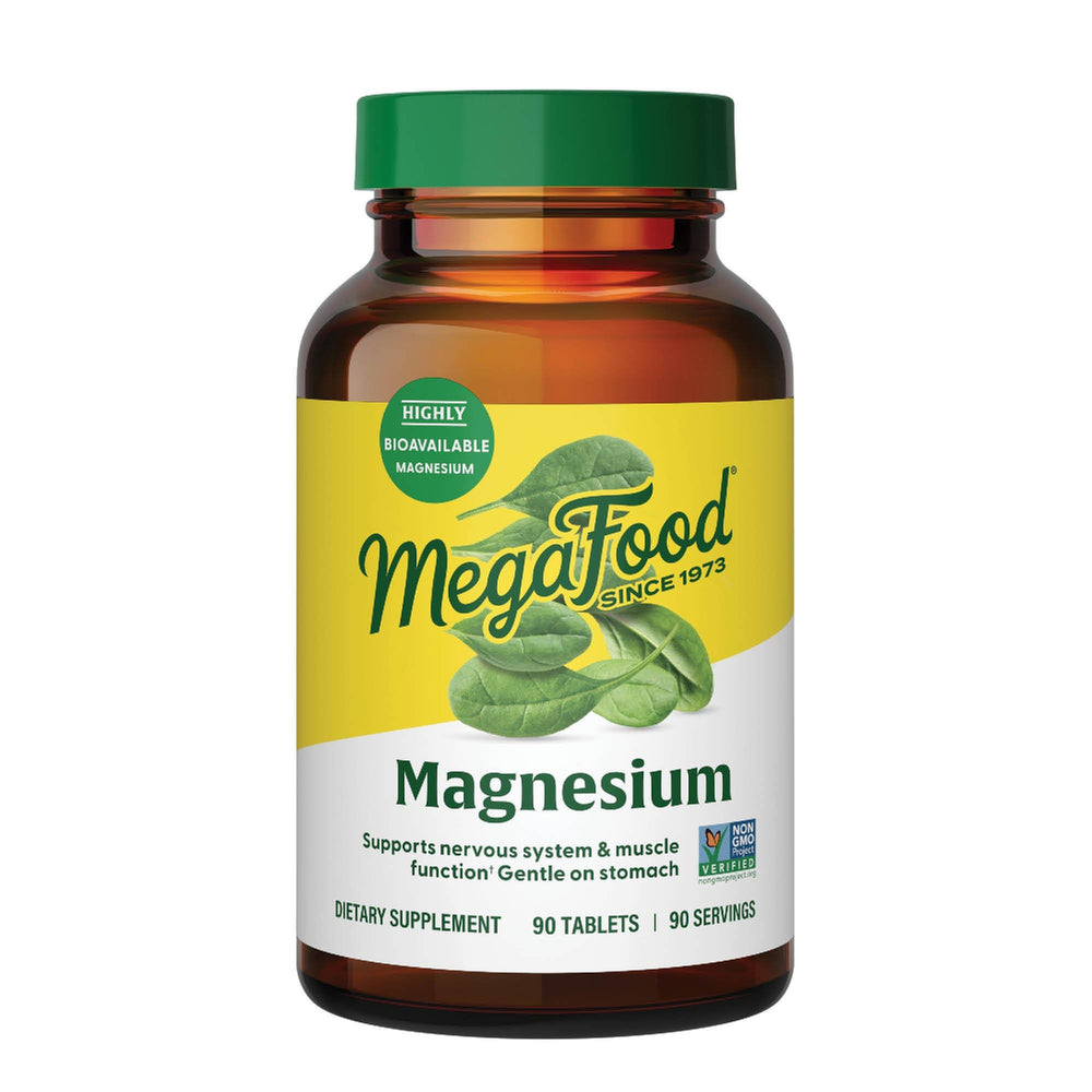 MegaFood magnesium bottle front, vegan daily wellness support.