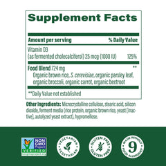 Close-up of MegaFood Vitamin D3 tablets highlighting vegetarian, non-GMO formula.