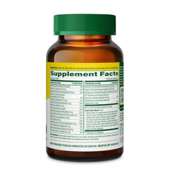 Pills arranged near the MegaFood label signaling consistent daily nutrition
