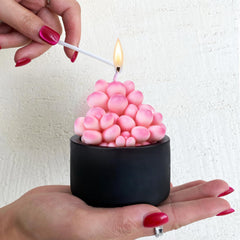 Mesiiloly candle in black vase creates a striking decor focal point