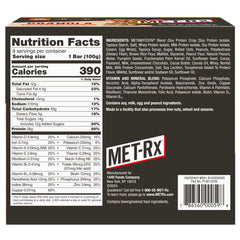 MET-Rx Big 100 nutrition facts label highlights protein and vitamins.