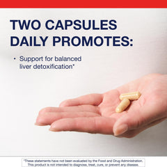 AdvaClear capsules in hand for daily detox routine.