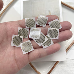 METAL ARTEM Flower of Life gold sticker on a laptop showcasing sacred geometry