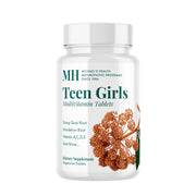 Michael's Health Naturopathic Teen Girls Multivitamin bottle on kitchen counter for daily teen wellness.