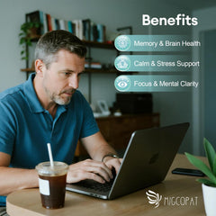 Migcopat packaging on shelf conveys clean, non-GMO, caffeine-free design for daily calm focus.