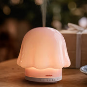 mimicat soft blush glass diffuser in pink adding subtle ambience to bedside routines