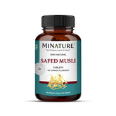 Minature Safed Musli tablets bottle on desk highlights a pure plant-based herbal supplement for daily vitality.