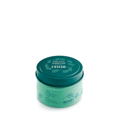 Mint tin candle wax close-up showing soy-based formula for clean burning.