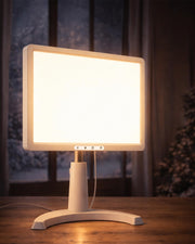 MirthSip 10000 Lux UV-free daylight lamp on a desk for focused reading