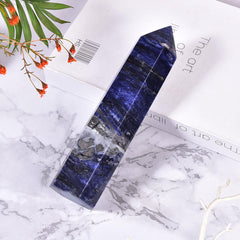 MOGEMT blue sodalite crystal tower six-faceted point for focused energy work.
