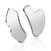 MoHern stainless steel gua sha tool for the face, promoting soothing massage and toned skin.